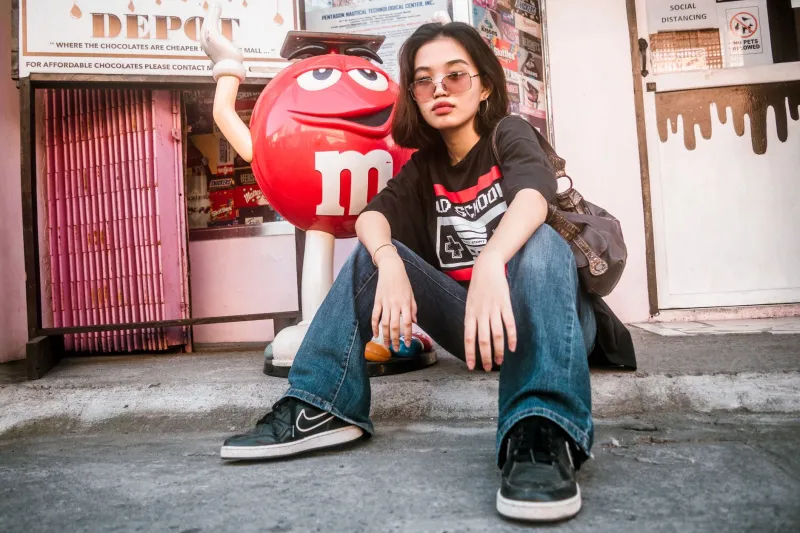 When Your Fave Wears Someone Else's Logo: The Complicated Truth Behind Creator Fashion Choices
